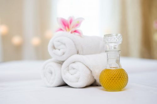 Towel with spa oil for spa setting